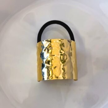 Gilded Grip – Metal Tug Hair ties